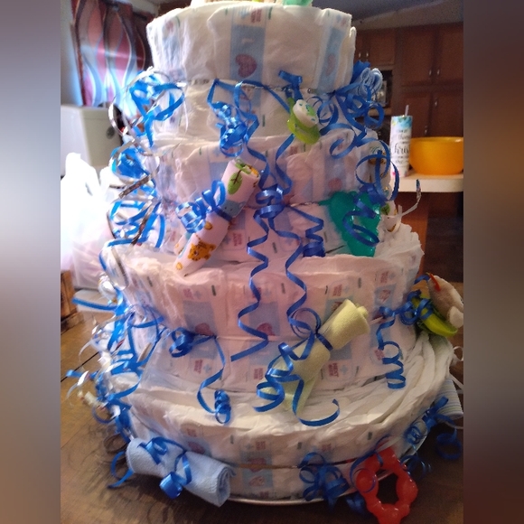 Hand made diaper cake with accessories attached - Picture 2 of 4